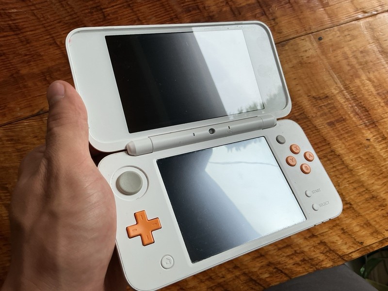 Nintendo 2DS XL White & Orange Tested and Working! Clean Screens! With Charger gallery