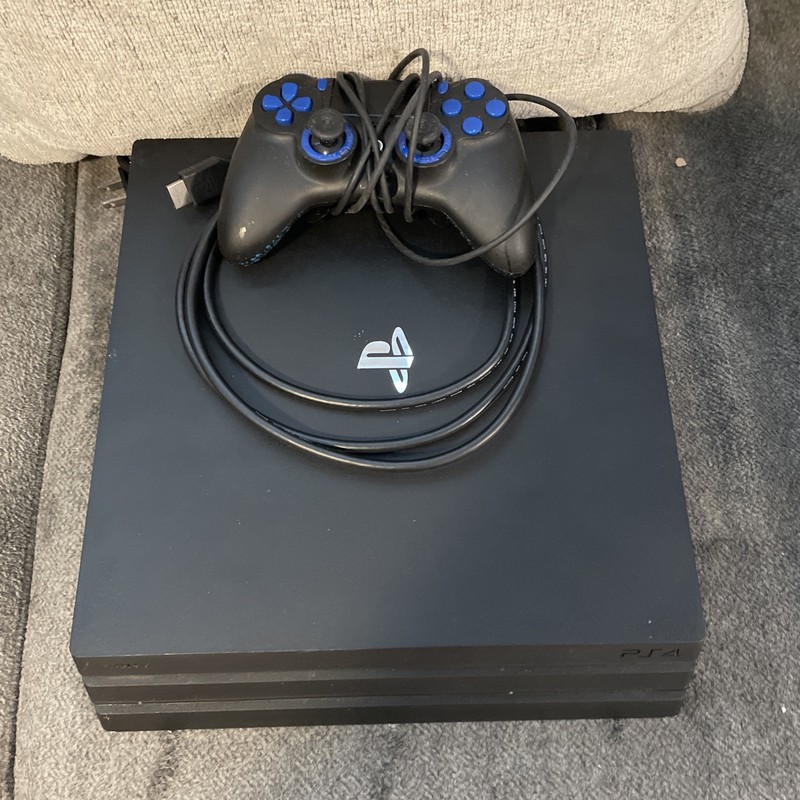 Sony PlayStation 4 Pro 1TB Console – Black w/ Scuff Impact Controller