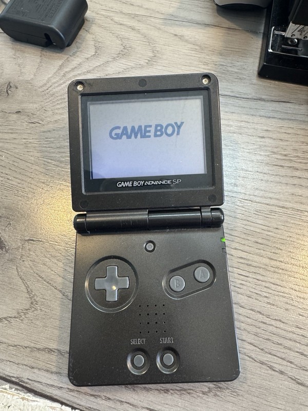 Nintendo Game Boy Advance Onyx black- Along With 7 Games And 4 Game Cases