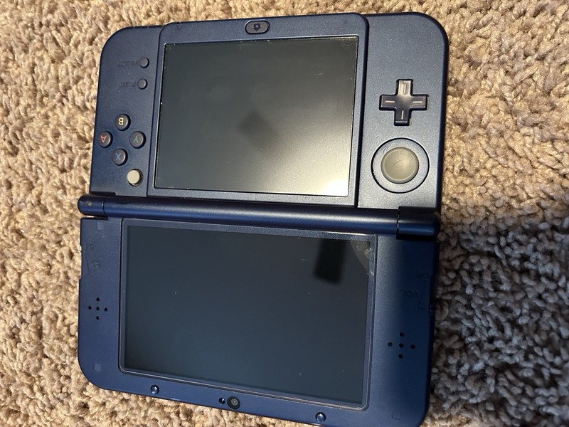 Nintendo 3ds Galaxy XL, in good condition, comes with box, charger, and 9 games! gallery