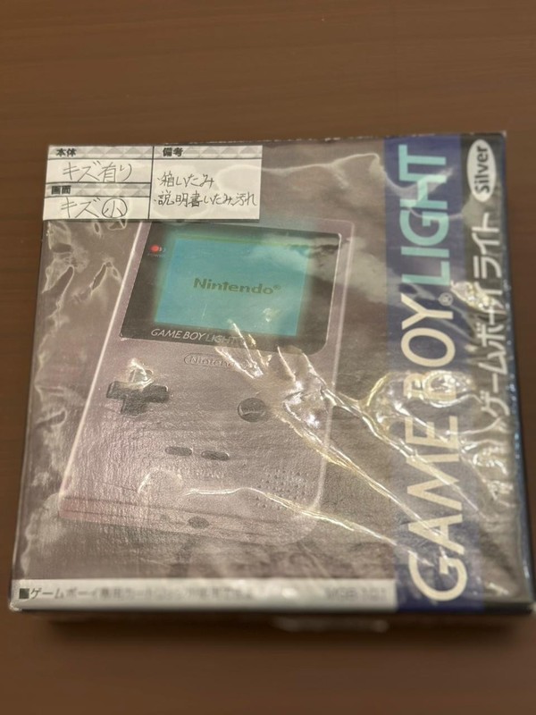 Nintendo Game Boy Light Launch Edition Silver , Sealed . with old invoice gallery