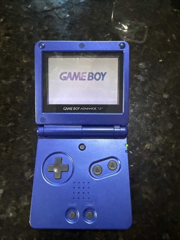 Game Boy Advance SP Handheld System Blue Includes Charger With Games With Case gallery