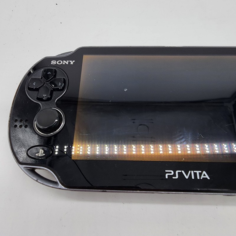 PlayStation PS Vita PCH-1001 Bundle - 5 Games, Memory Card, 8 GB Charger gallery