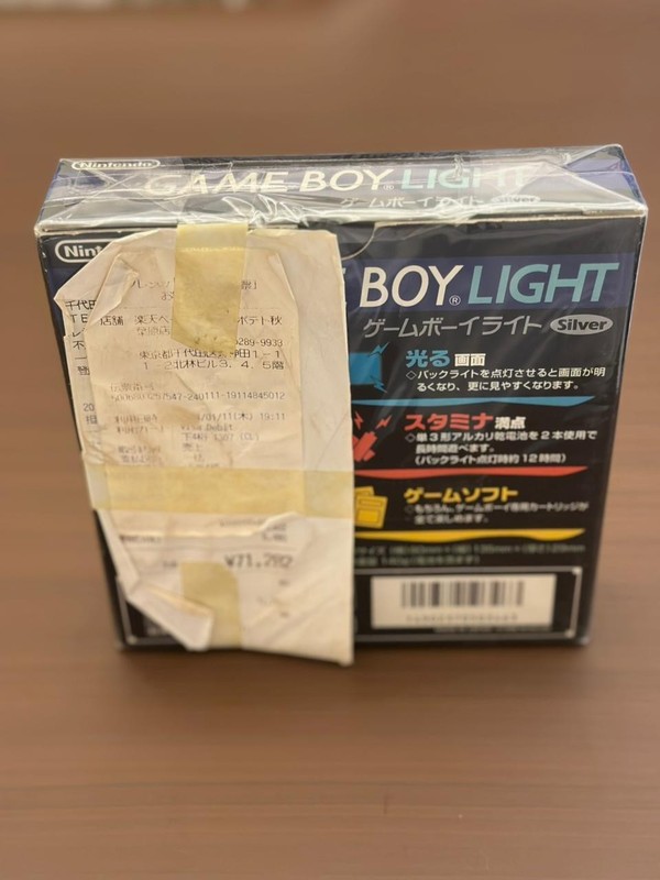 Nintendo Game Boy Light Launch Edition Silver , Sealed . with old invoice gallery