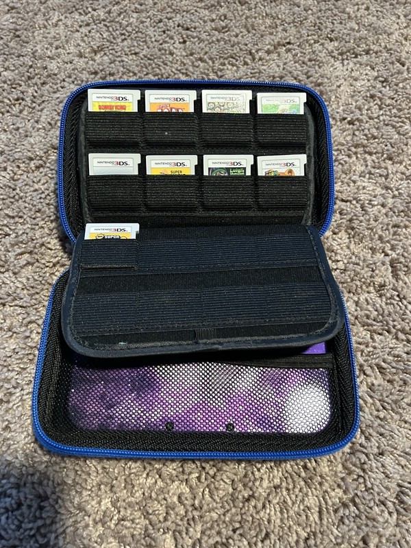 Nintendo 3ds Galaxy XL, in good condition, comes with box, charger, and 9 games! gallery
