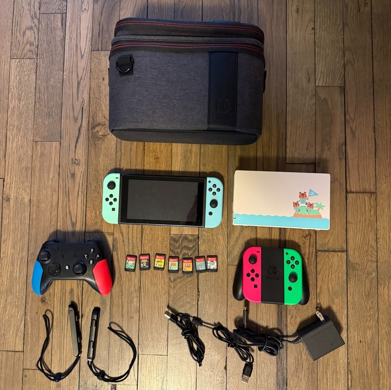 Nintendo Switch Animal Crossing Edition Bundle w/ 7 Games, 4 Joy-Cons, Case