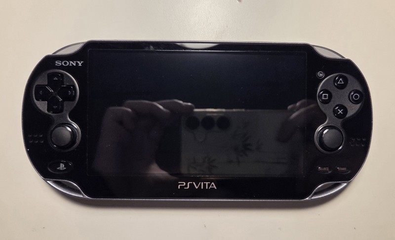 JAPANESE Sony PlayStation Vita Wi-Fi + 3G Crystal Black Handheld System gallery