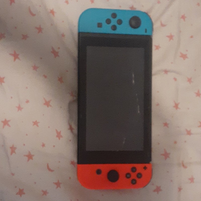 Nintendo Switch Handheld Console with Red & Blue Detachable Joy-Con Controllers