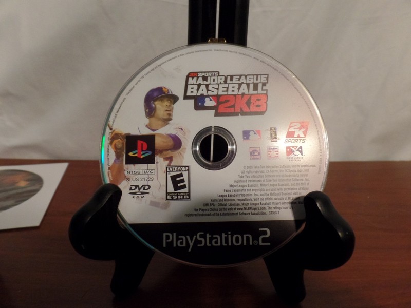 Sony PlayStation 2 Black Console W/ 2 Controllers. Memory Card, and Games gallery