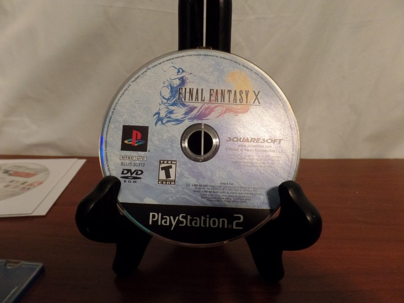 Sony PlayStation 2 Black Console W/ 2 Controllers. Memory Card, and Games gallery