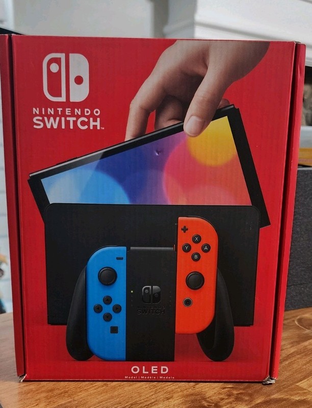 Blue and Red Nintendo Switch OLED – comes wirh 128gb SD card