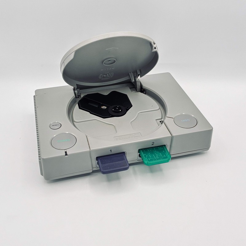 Sony PlayStation 1 (SCPH-1001) Gray w/ 2 external memory cards gallery