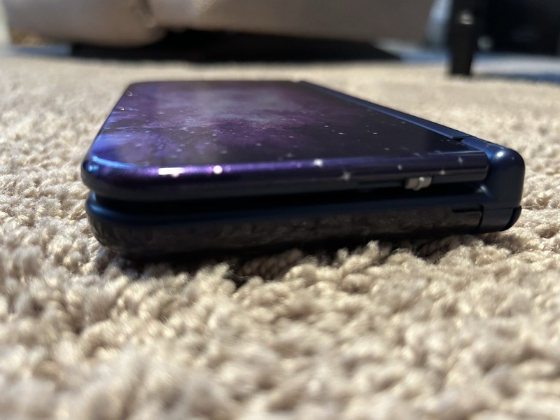 Nintendo 3ds Galaxy XL, in good condition, comes with box, charger, and 9 games! gallery