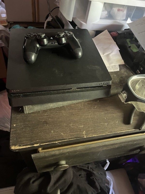 Black PlayStation 4 With One Controller A 10 Ft HDMI Cord And A Mortal Combat Cd