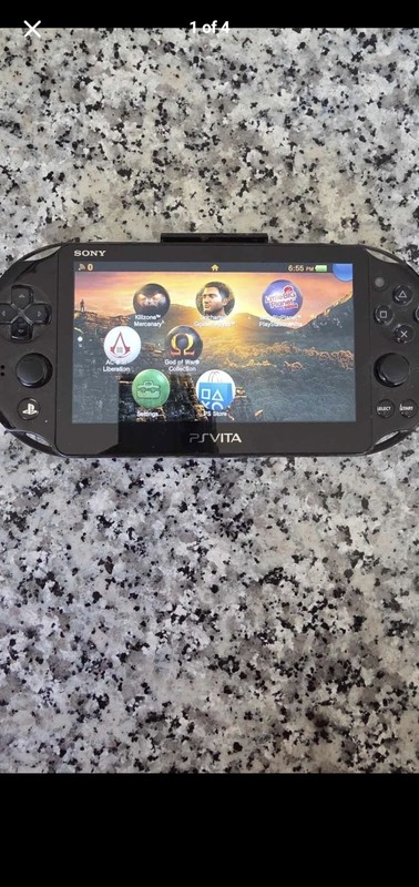 Sony PS Vita PCH-1000 Black 16GB Wi-Fi Bluetooth NTSC-U/C w/2 Games