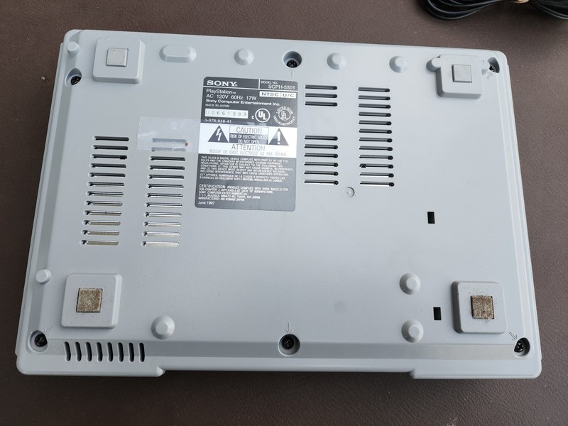Sony PS1 SCPH-5501 console with hookups and controller gallery