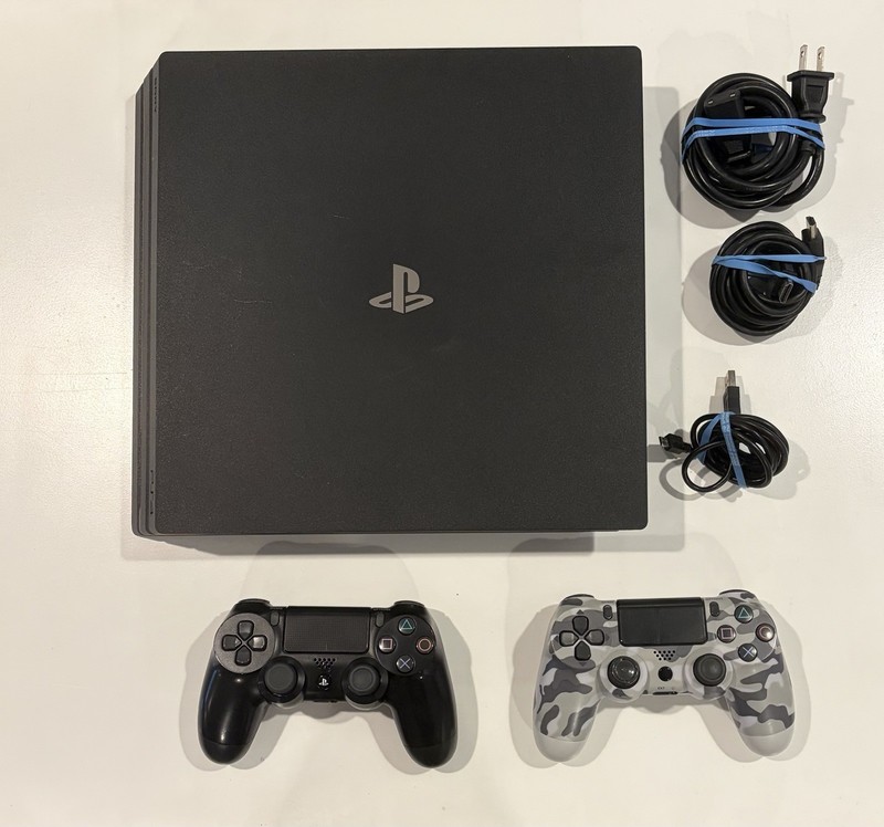 PlayStation 4 Pro 1TB w/ TWO DualShock 4 Controllers & All Cords Included