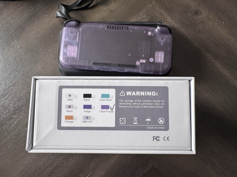 Retroid Pocket 3+ Clear Purple Handheld System with Carrying Case gallery