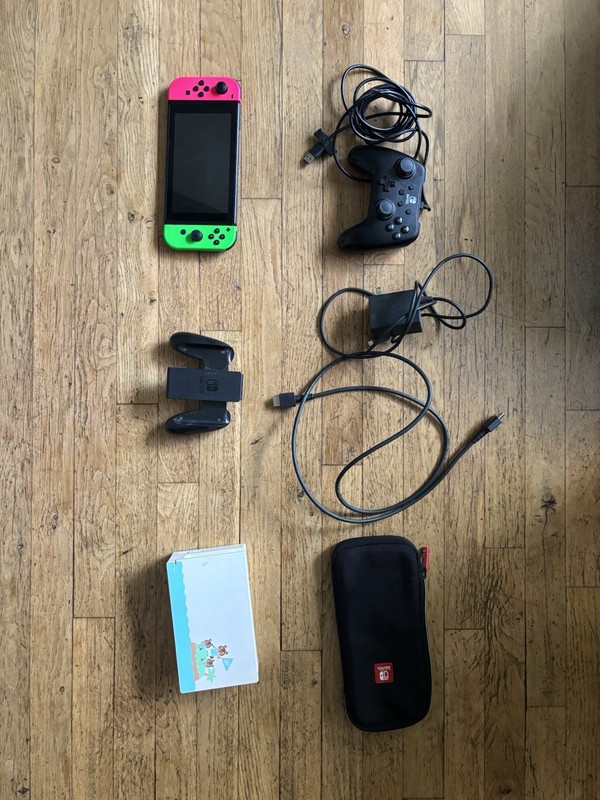 Nintendo Switch Console + Neon Pink/Green Joy-Con + Dock + Controllers + Case