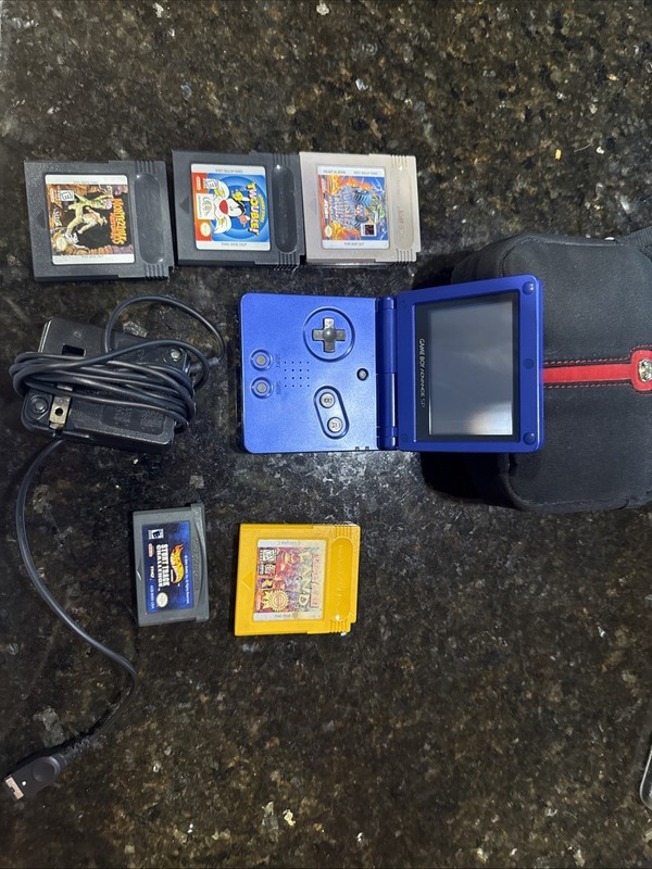 Game Boy Advance SP Handheld System Blue Includes Charger With Games With Case