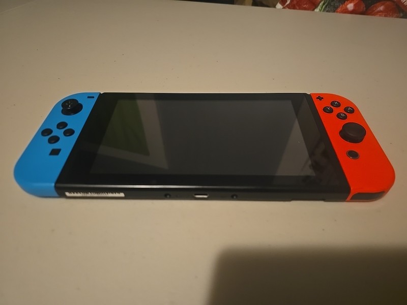 Nintendo Switch 32GB Handheld Console – Neon Red/Neon Blue