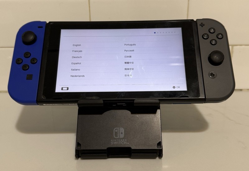 Nintendo Switch 128GB Blue/Gray/Black Console w/ Joy-Con, Dock & Charger gallery