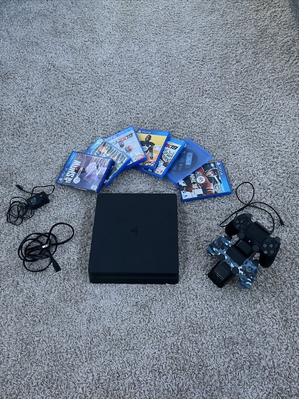 Sony PlayStation 4 Pro 1TB – Jet Black – 2 Controllers – Charging Stand – 7 Game