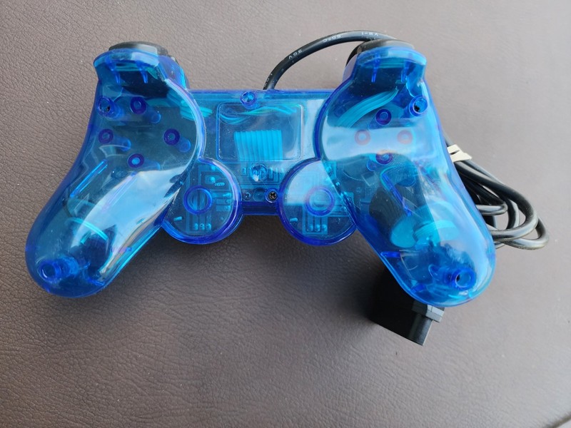 Sony PS1 SCPH-5501 console with hookups and controller gallery