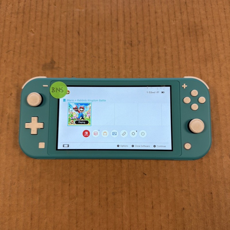 (Z310) Nintendo Switch Lite Teal W/ Game (No Charger) Tested