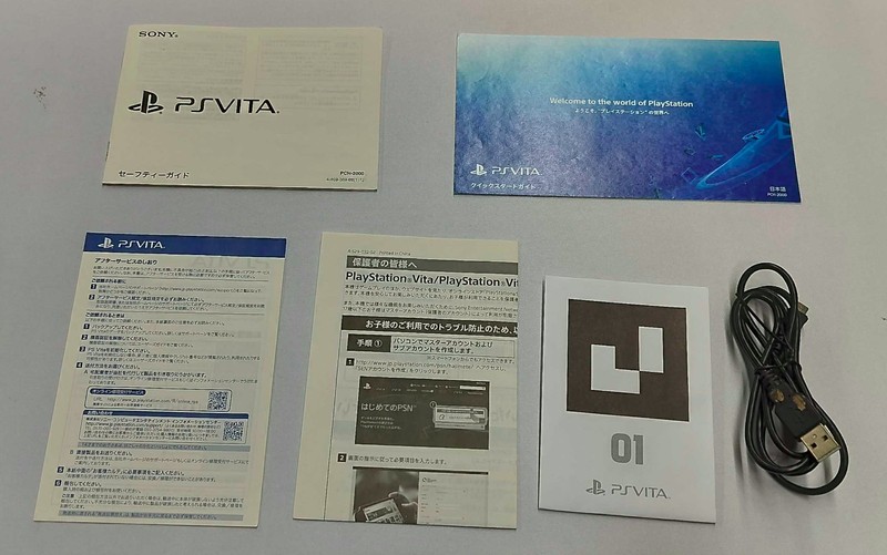 Sony PS Vita 2000 JP Pink Black Region Free Tested Working with box and manuals gallery