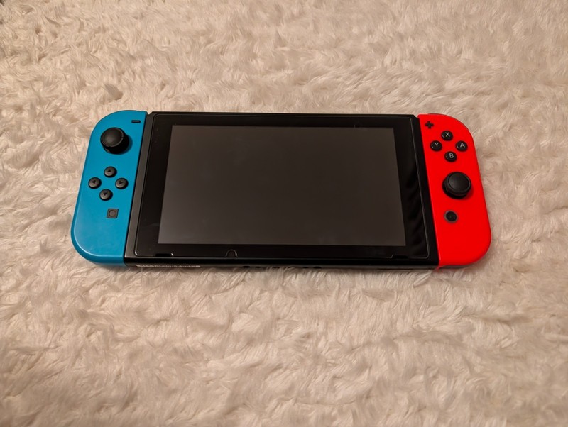 Switch 1 Neon Blue/Neon Red JoyCon w/ charger, dock, cable, grip, traveling case gallery