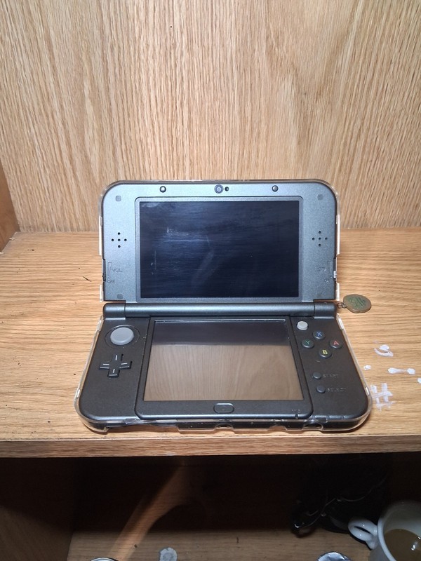 Nintendo New 3DS XL 4GB Handheld Gaming System - Black gallery