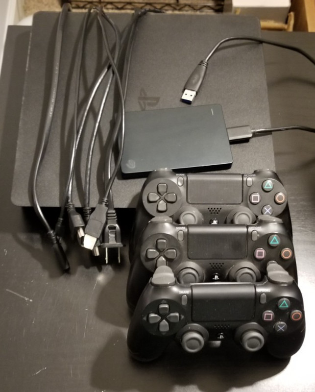 Sony PlayStation 4 Slim 500gb Includes 3 Dual Shock 4 Wireless Controllers