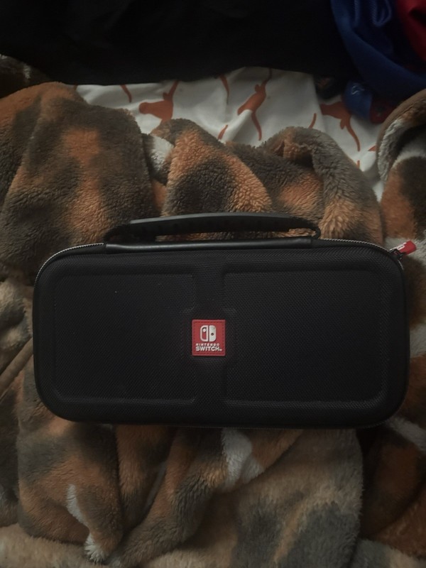 Nintendo Switch Console Black with Blue and Red Joy-Con Detachable Controllers