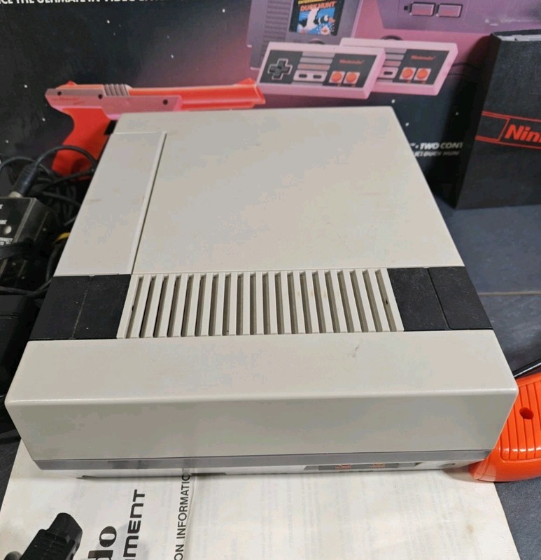 Nintendo NES Console with Original Box, Zapper, Controllers, Instructions, Cords gallery
