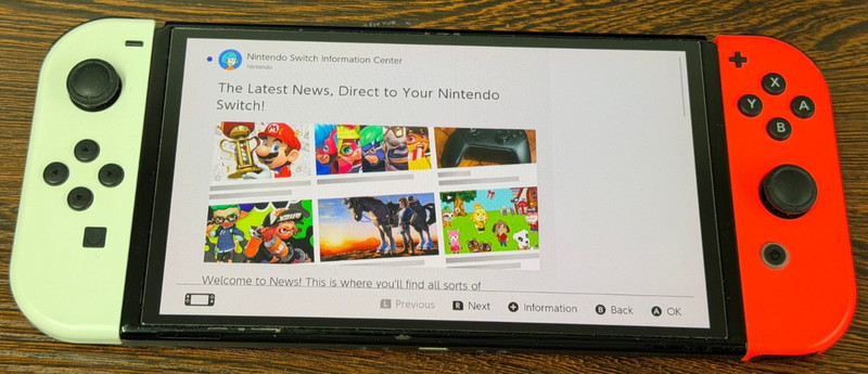 Nintendo Switch OLED Model 64GB Neon Red White Joycons – Good Used Condition