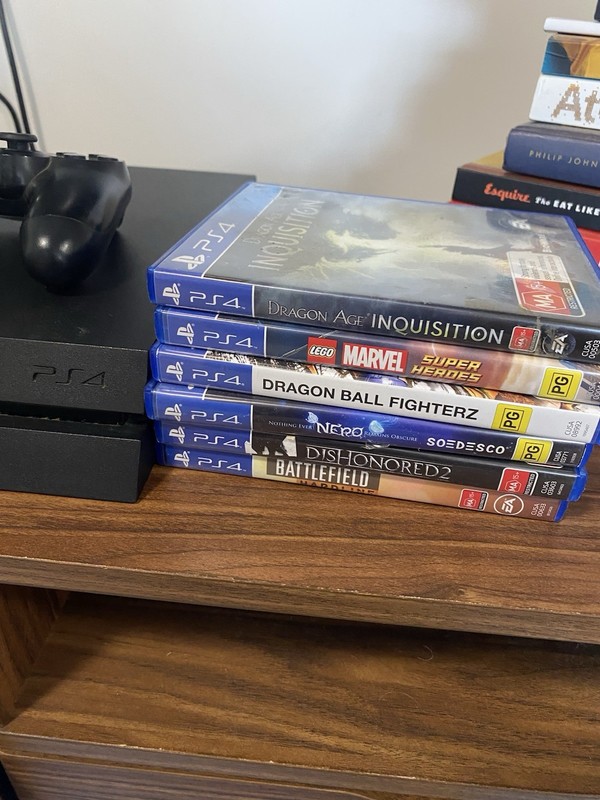 Sony playstation ps4 Fat 1tb console bundle with 7 Games Cords 1 Controller gallery