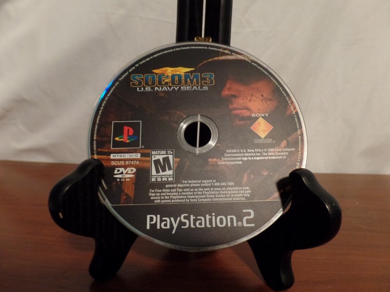Sony PlayStation 2 Black Console W/ 2 Controllers. Memory Card, and Games gallery