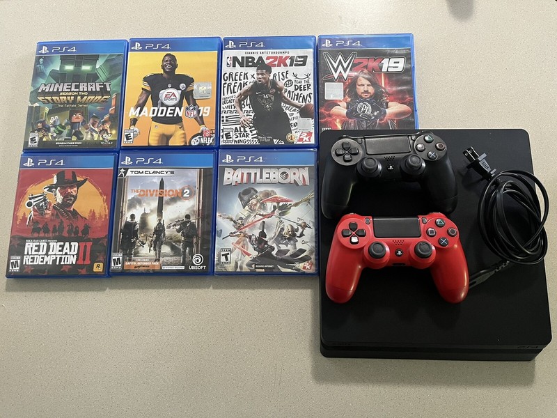 Sony PlayStation 4 Slim 1TB Console – Jet Black with 7 Very Fun Playable Games