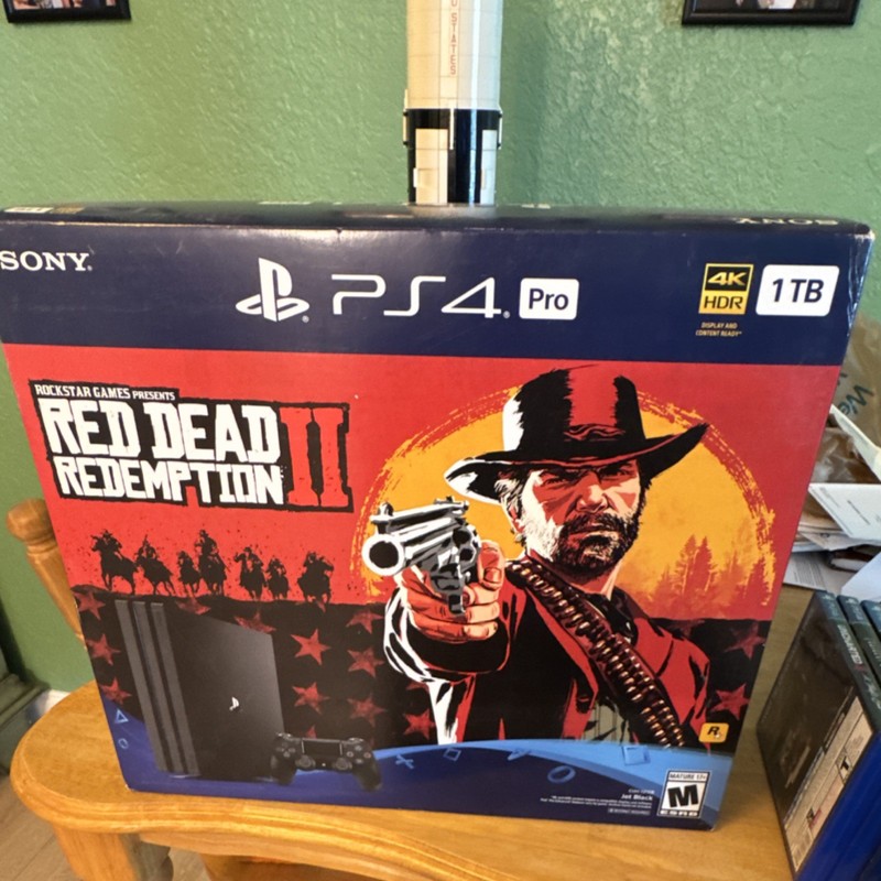 Sony PS4 Pro 1TB Black 4K Console CUH-7215B w/ DualShock 4 and red dead 2